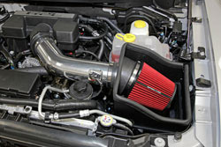 The Spectre 9977 intake has a red air filter, aluminum tube, and heat shield.