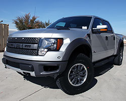 F-Series pickups, like this 2011 Ford F150 SVT Raptor with a 6.2L V8 engine can receive increased airflow and performance from a Spectre HPR filter