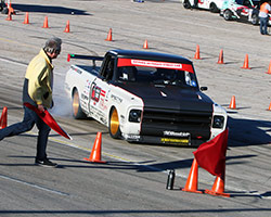 The OUSCI speed stop is Brandy Phillips’ least favorite part of the OUSCI because the PCH Rods 1972 Chevy C10 R tends to lock up the rear wheels