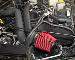 Engine bay shot of 1997-2006 Jeep Wrangler 4.0L air intake by Spectre