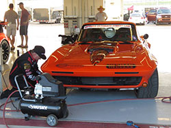 Greg Thurmond working on his 1965 Chevy Corvette