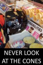 View of Prouty in helmet & suit at the ice cream section with caption "Never look at the Co