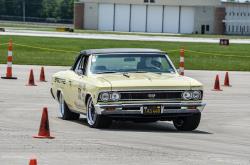 View of Lynda Jacobs on the autocross course in her '66 Chevelle, Wimpy