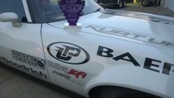 Photo pf Finch's 1971 Camaro and the OSUSC GTV Class Trophy for his win at NCM.