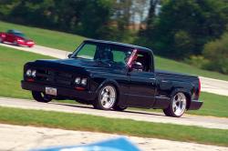 Photo of Smitty in the Black '67 GMC Truck at the Street Car Challenge at Putnam Park