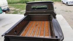 Mark made a wood floor for the bed from Red Oak he purchased at Home Depot