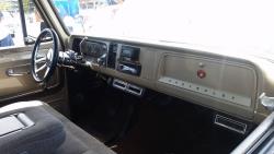 The interior is clean and simple with a bench seat out of a 1995 Silverado and a new steering column