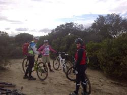 Mary featured here with friends on mountain bikes on a Salinas trail.