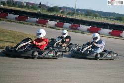 Mary, ahead of her friends and fellow competitors out on the go kart track.